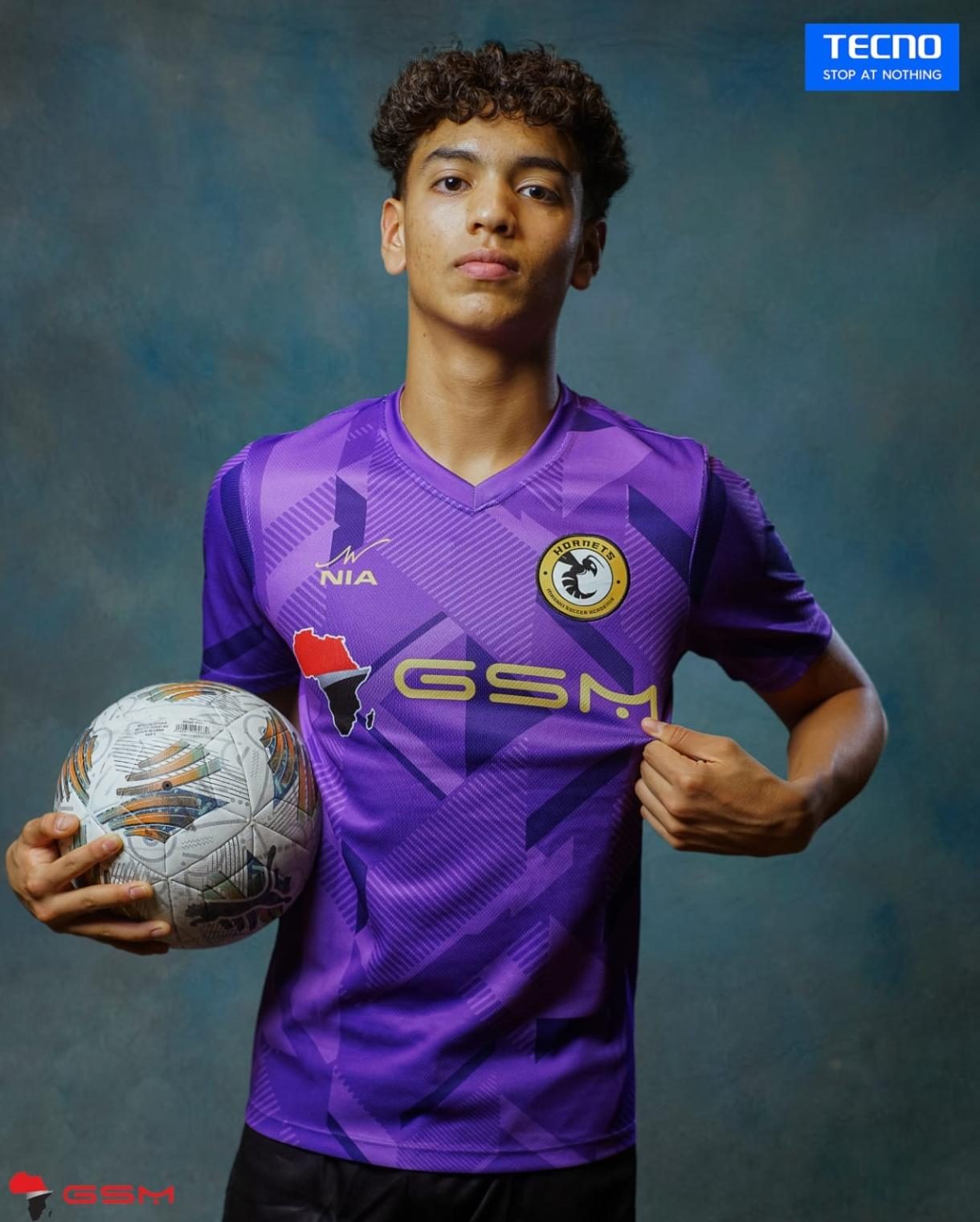 Young athlete in a custom NIA-made Hornets Soccer Academy kit