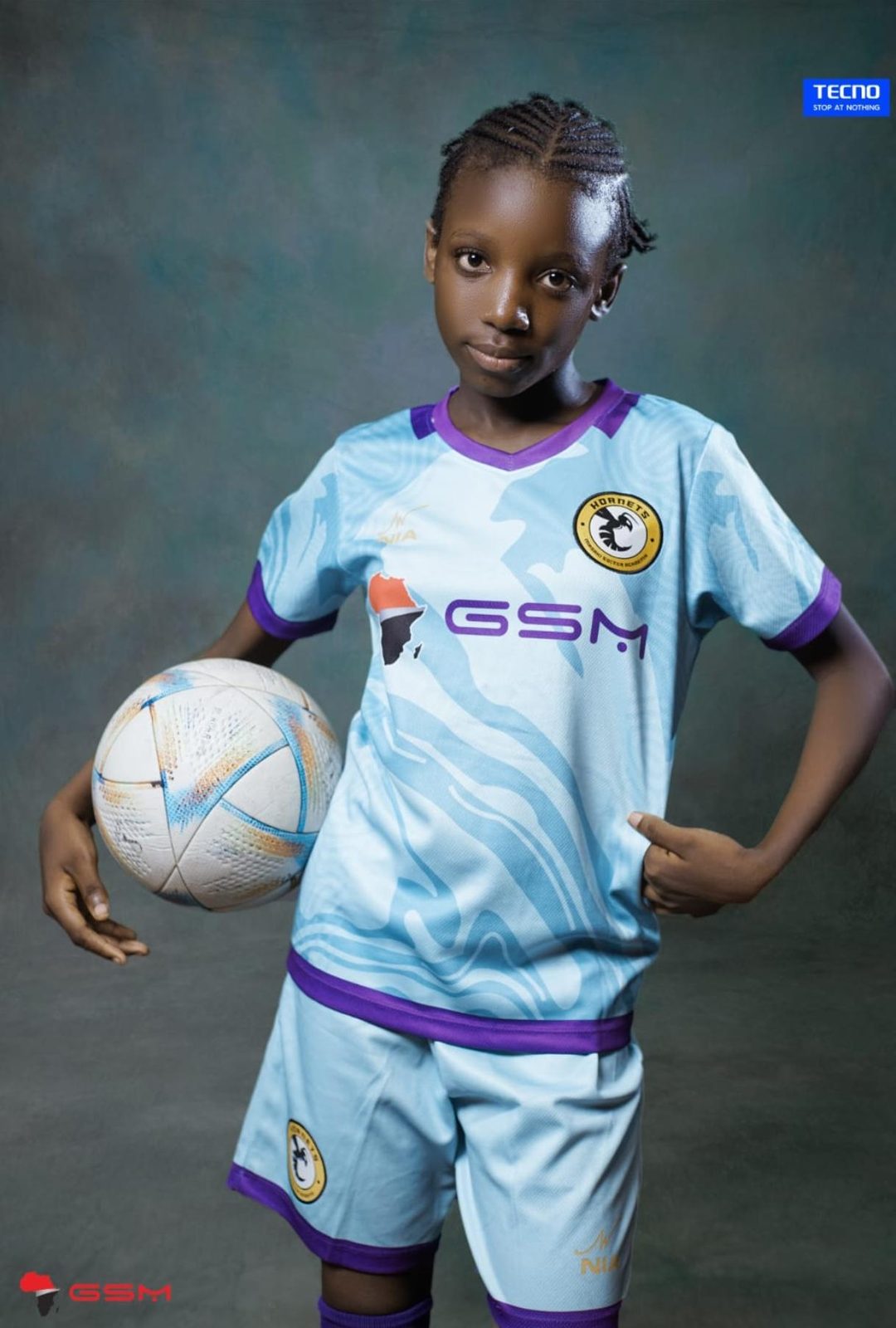 Hornets Soccer Academy player in the NIA-made away kit
