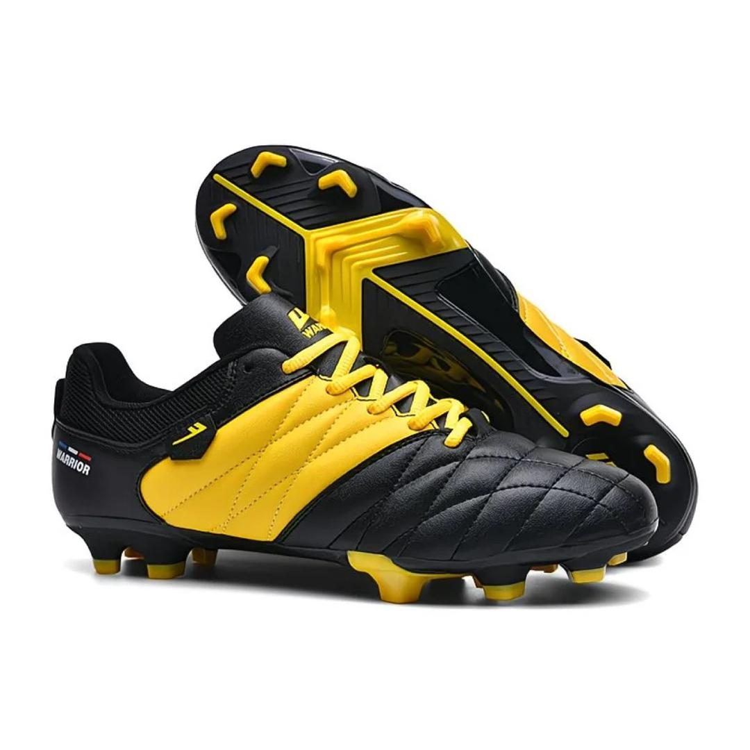 Black and gold football boots