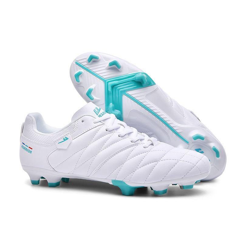 White and teal football boots