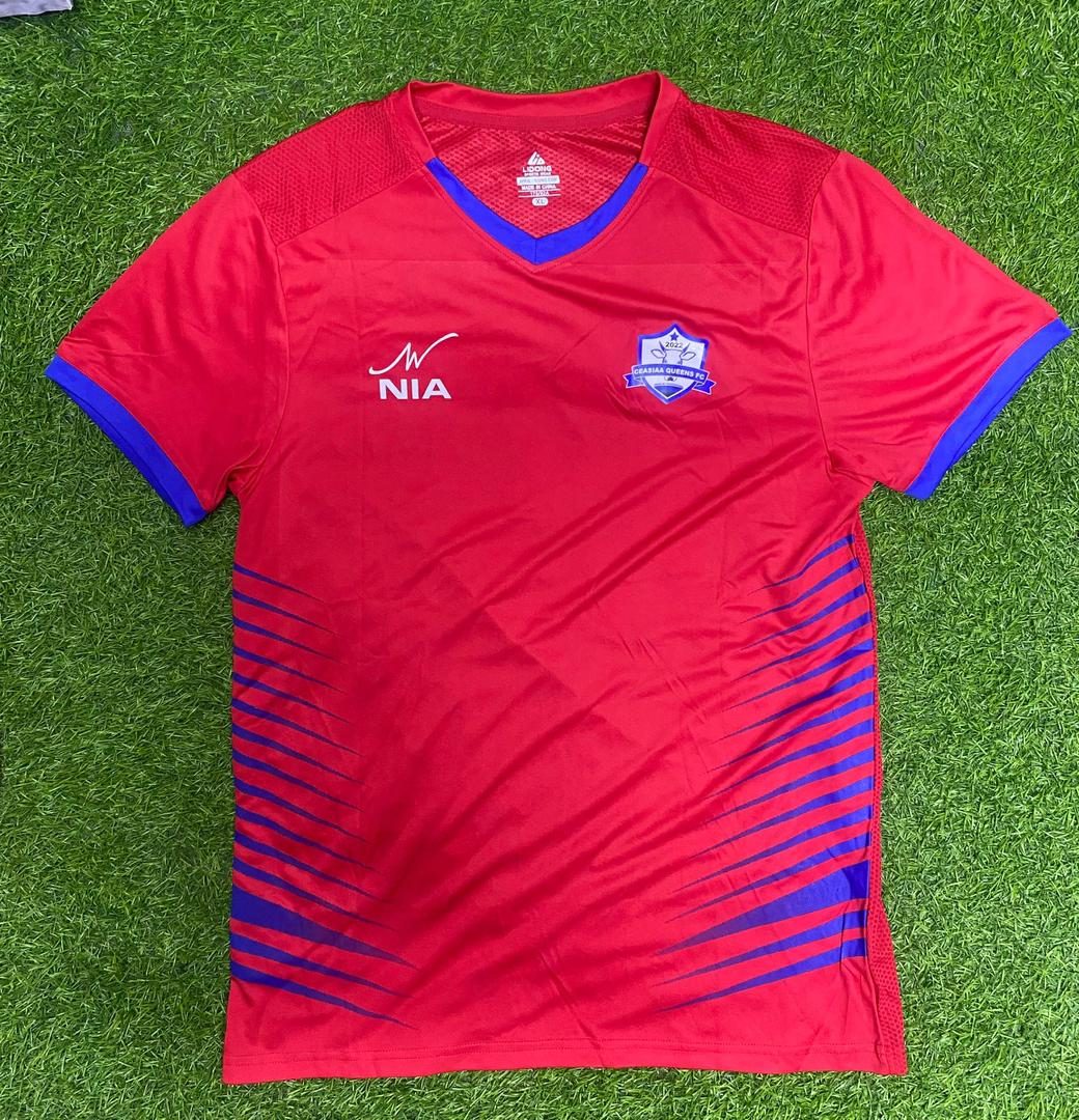 Red custom jersey with blue trim, front