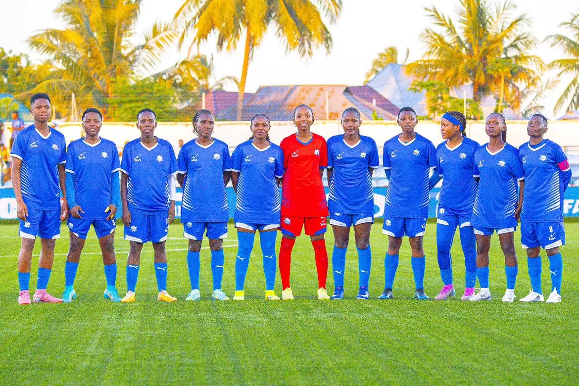 Ceasiaa Queens FC players celebrating in custom NIA kits